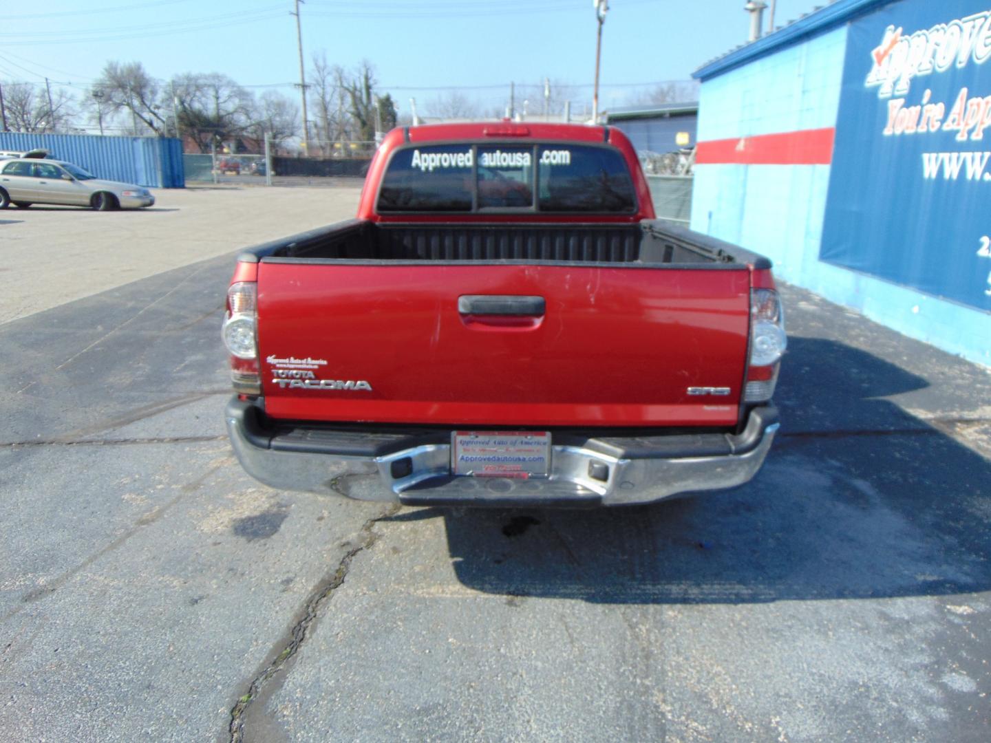 2009 Red Toyota Tacoma Access Cab (5TETX22N49Z) with an 4-Cyl 2.7 Liter engine, Manual, 5-Spd w/Overdrive transmission, located at 2105 Dixie Hwy, Louisville, KY, 40210, (502) 772-3333, 38.220932, -85.795441 - Photo#10